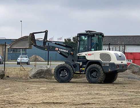 957701